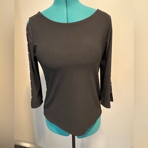Ladies top with peekaboo sleeves